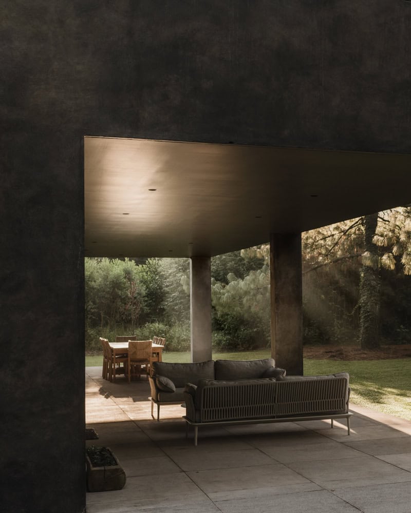 Ocote House by PPAA, shaded porch with sofa, Mexico