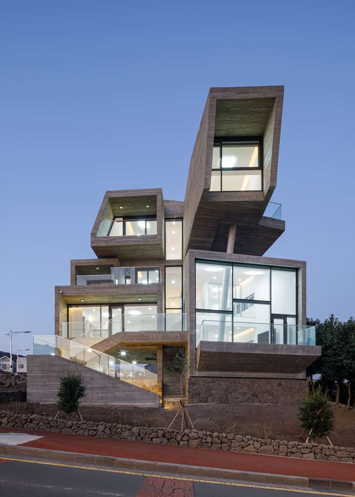 Pacific Residence by Moon Hoon cantilevered concrete street facade in Seogwipo, Jeju Island