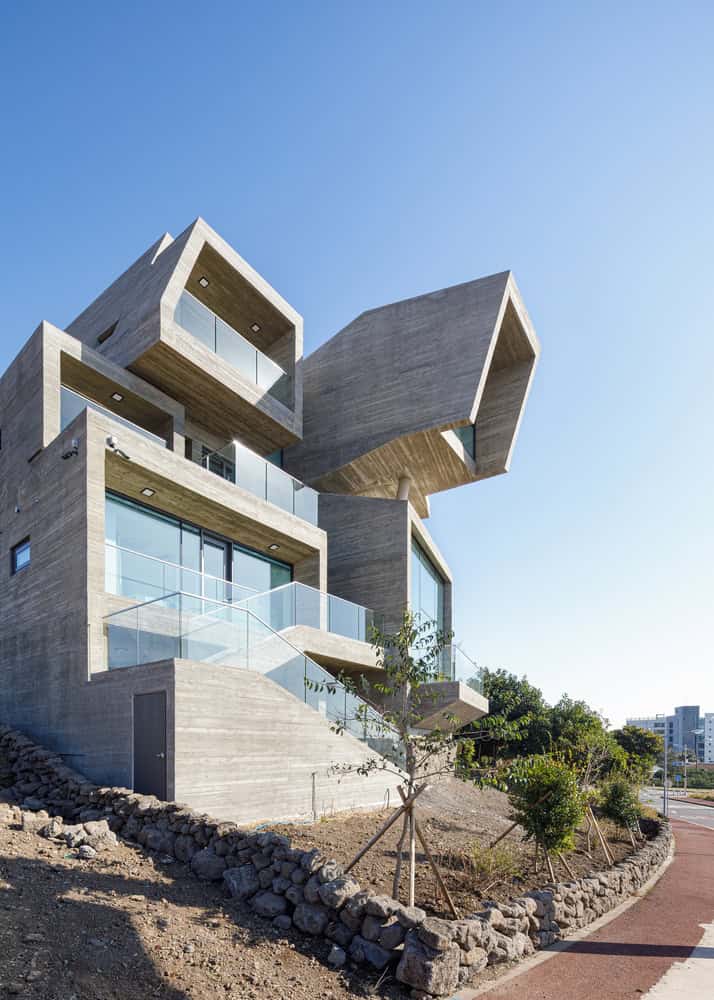 Pacific Residence by Moon Hoon side elevation with stepped terraces in Seogwipo