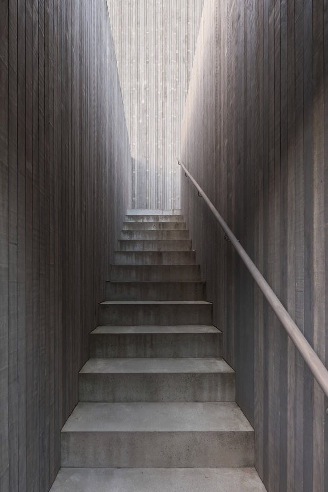 Re-folded House by McLeod Bovell Modern Houses, concrete stair lightwell, Vancouver