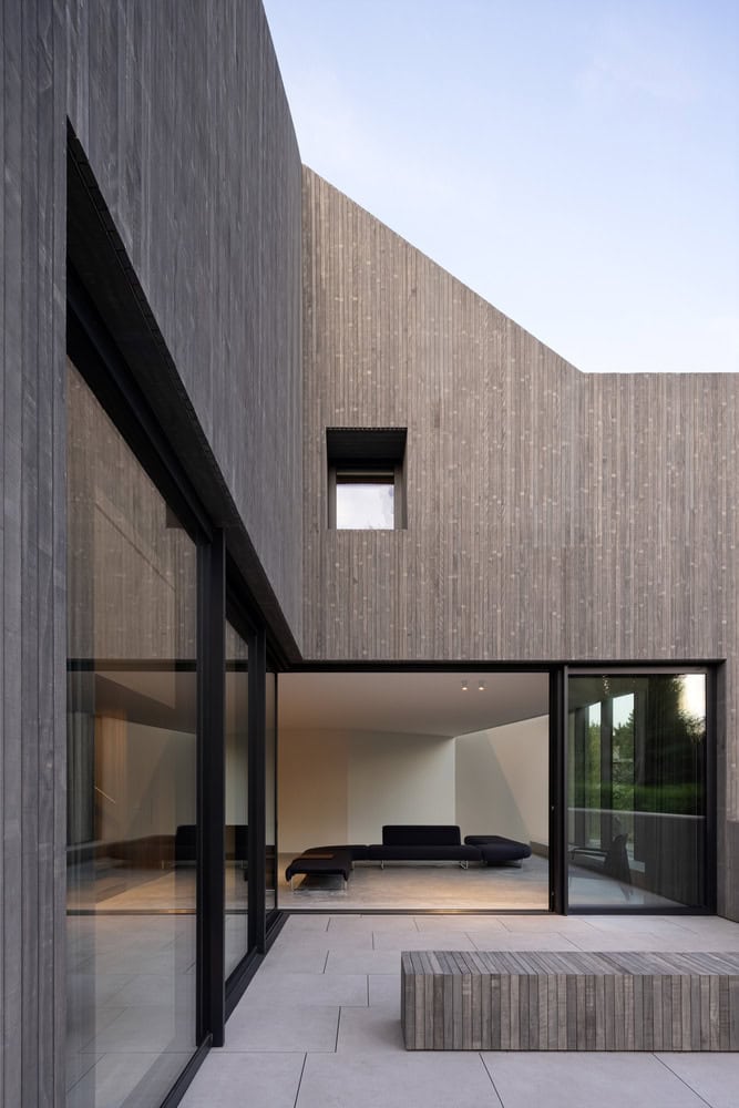 Re-folded House by McLeod Bovell Modern Houses, courtyard with sliders to living room, Vancouver