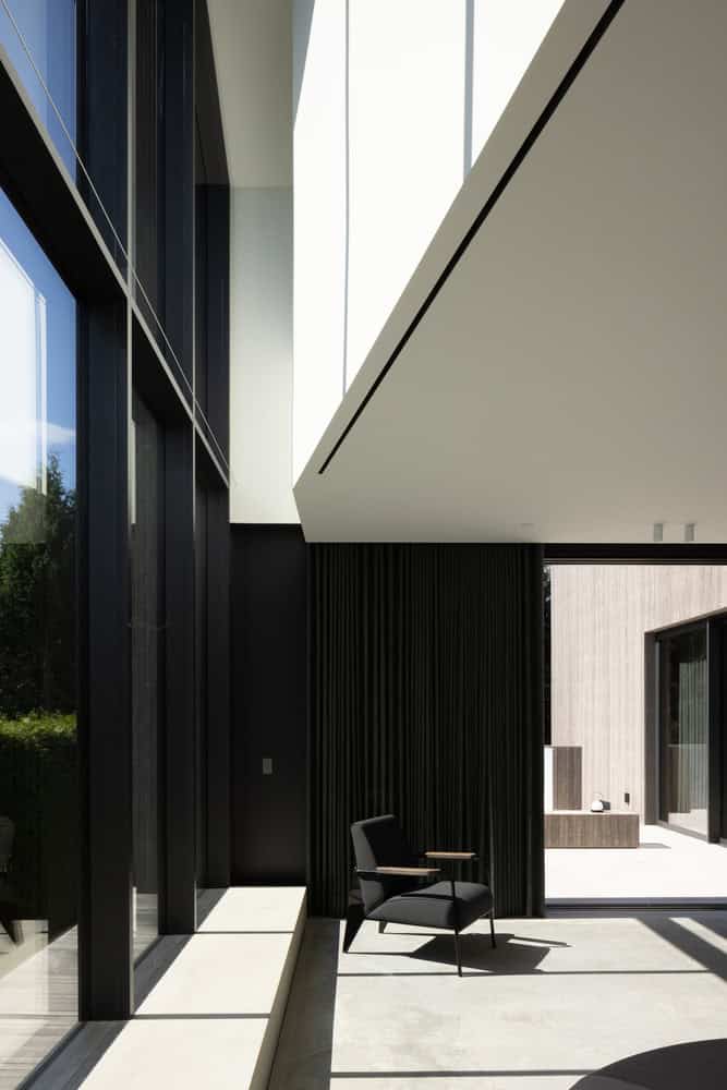 Re-folded House by McLeod Bovell Modern Houses, double-height glazing toward courtyard, Vancouver