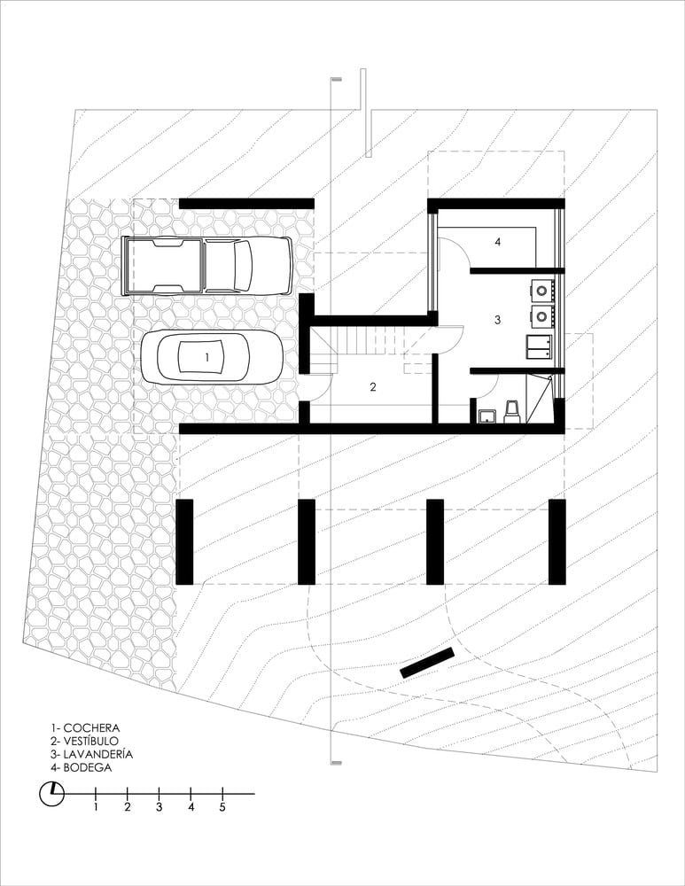 Basement floor plan of The Sierra House by Valdez Arquitectos showing garage, vestibule, laundry and storage areas in Chiapas, Mexico
