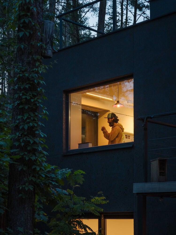 Skubianka House by SZCZ Jakub Szczesny, night window view in Skubianka