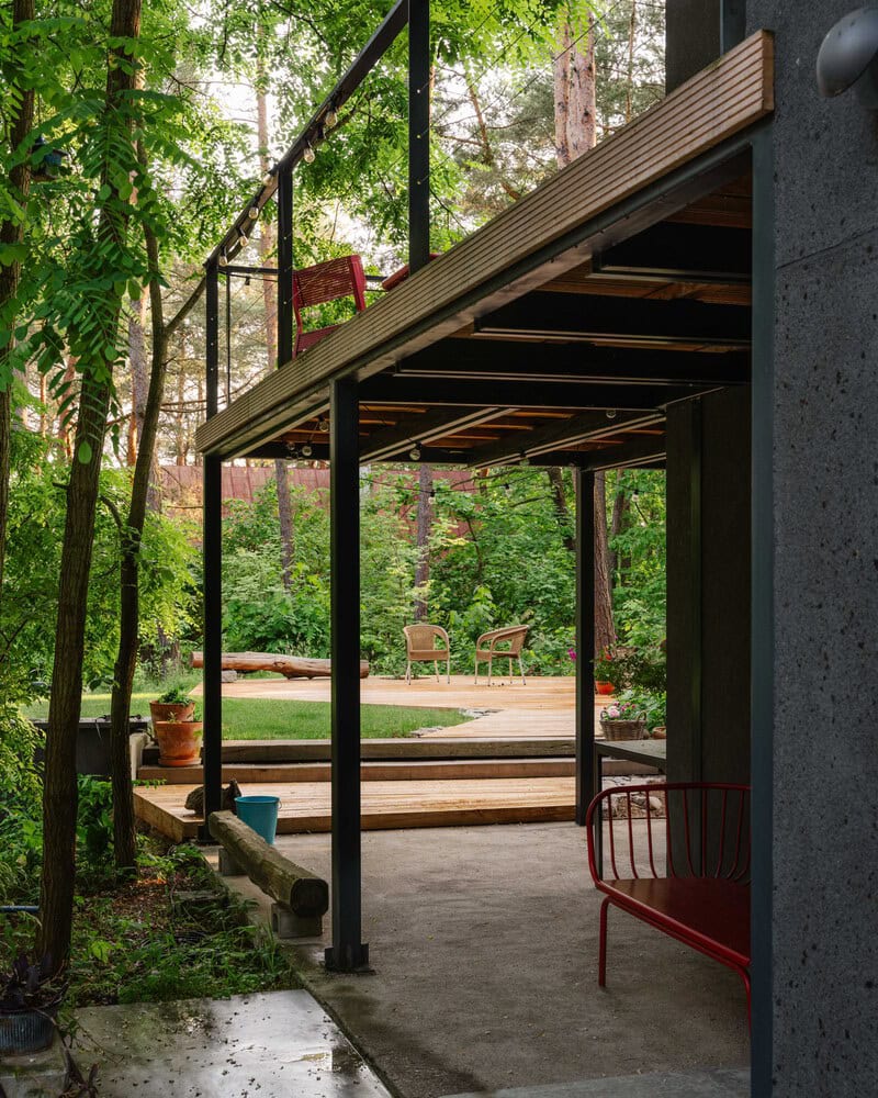 Covered terrace under the deck at Skubianka House by SZCZ Jakub Szczesny in Skubianka