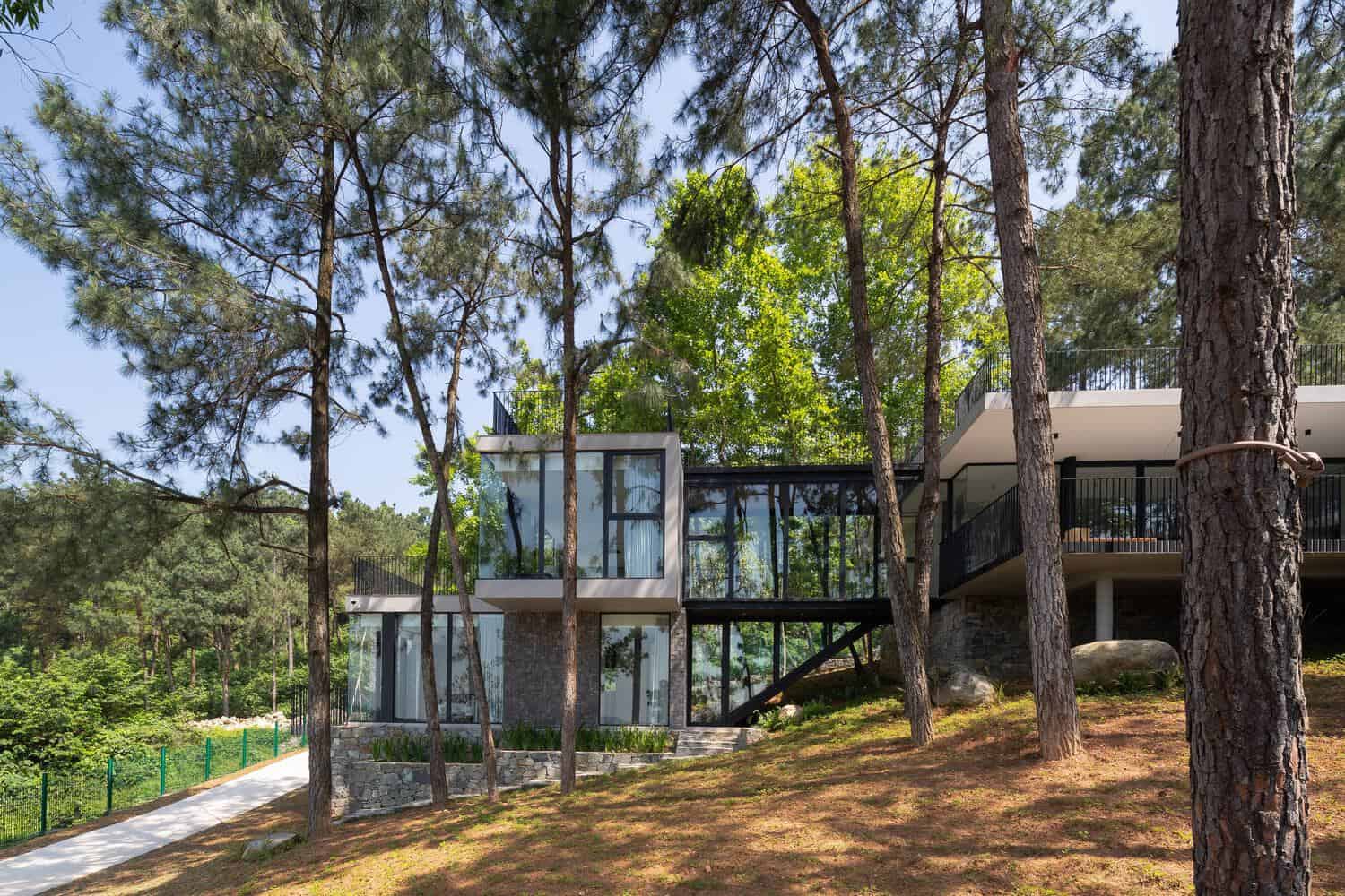 Tam Dao Retreat House by Idee architects corner cantilevered glass volume in Tam Dao, Vietnam