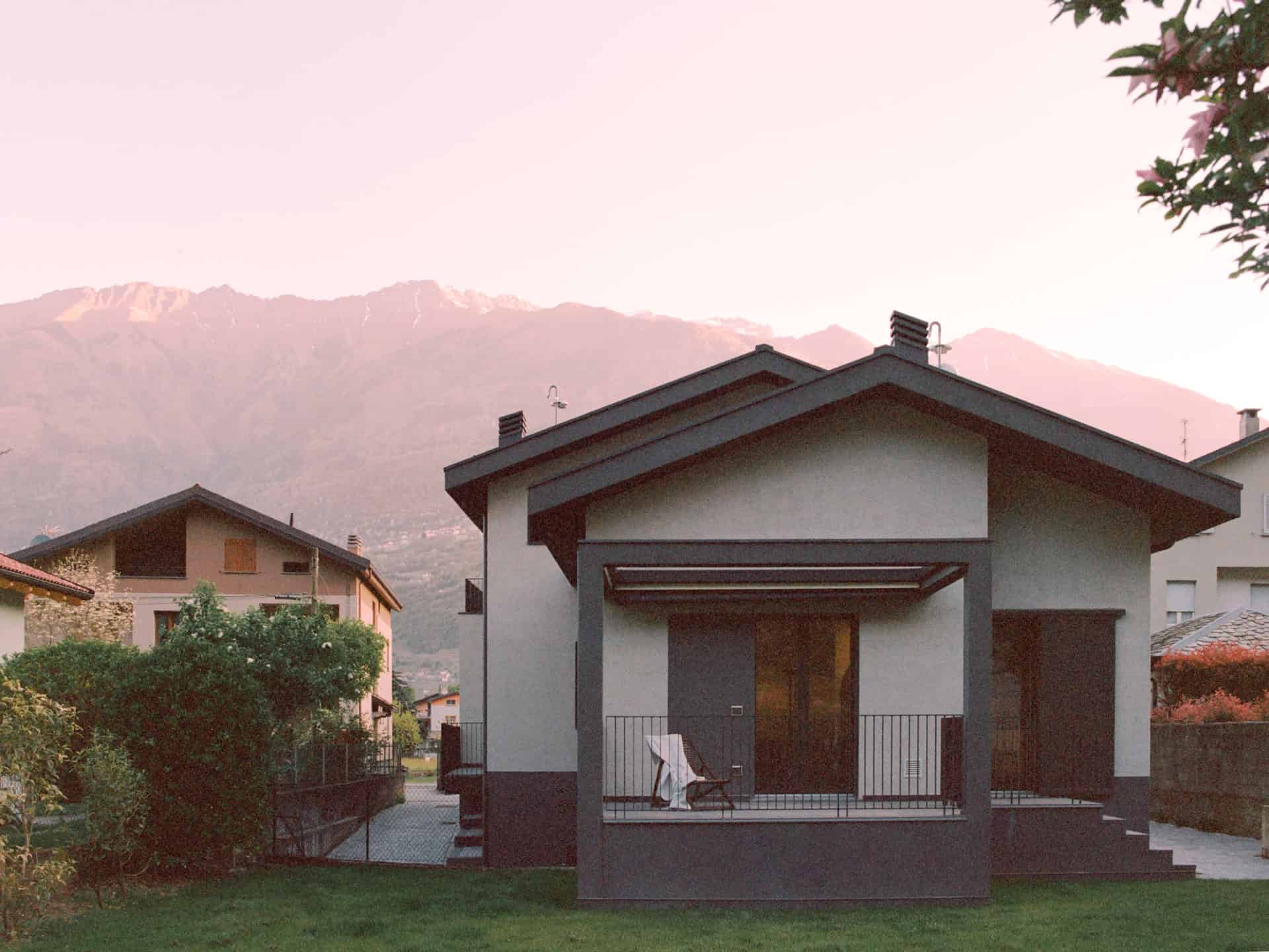 Modern house with minimalist architecture, sleek design, and stylish exterior in a scenic mountain setting. Perfect for contemporary home design enthusiasts.