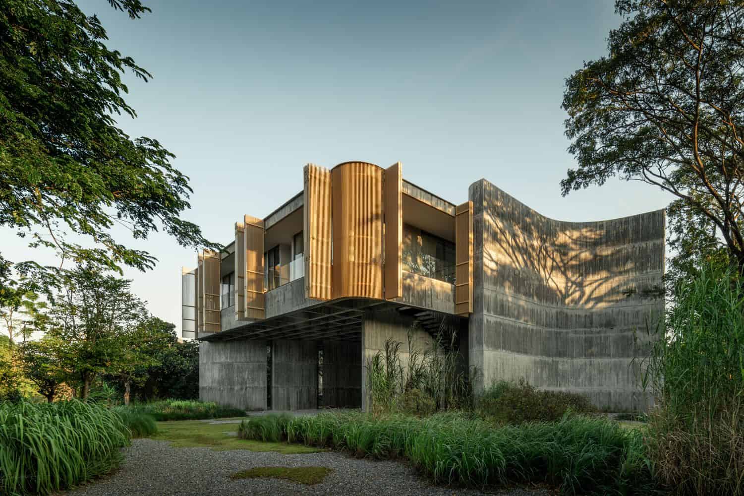 Corner volume of W House II by IDIN Architects with landscape in Thailand