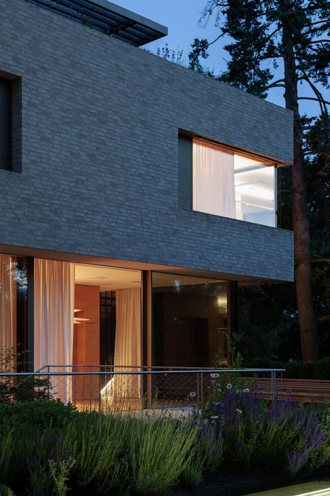 Villa Vista by Znameni Ctyr Architekti, night garden facade with soft landscape and facade lighting