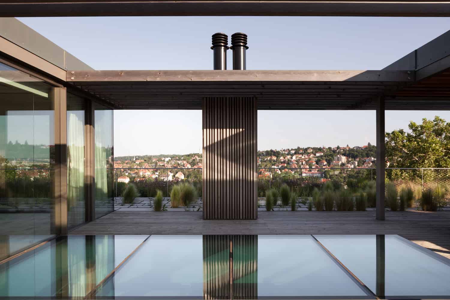 Villa Vista by Znameni Ctyr Architekti, roof terrace with pool and panoramic city view in Prague